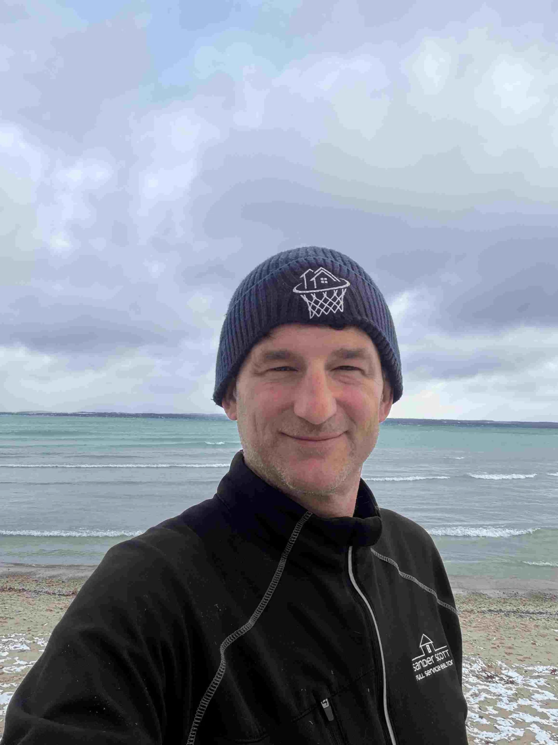 sander-scott-northport-mi-waterfront-realtor-cherry-home-shores-subject-property-beach-selfie